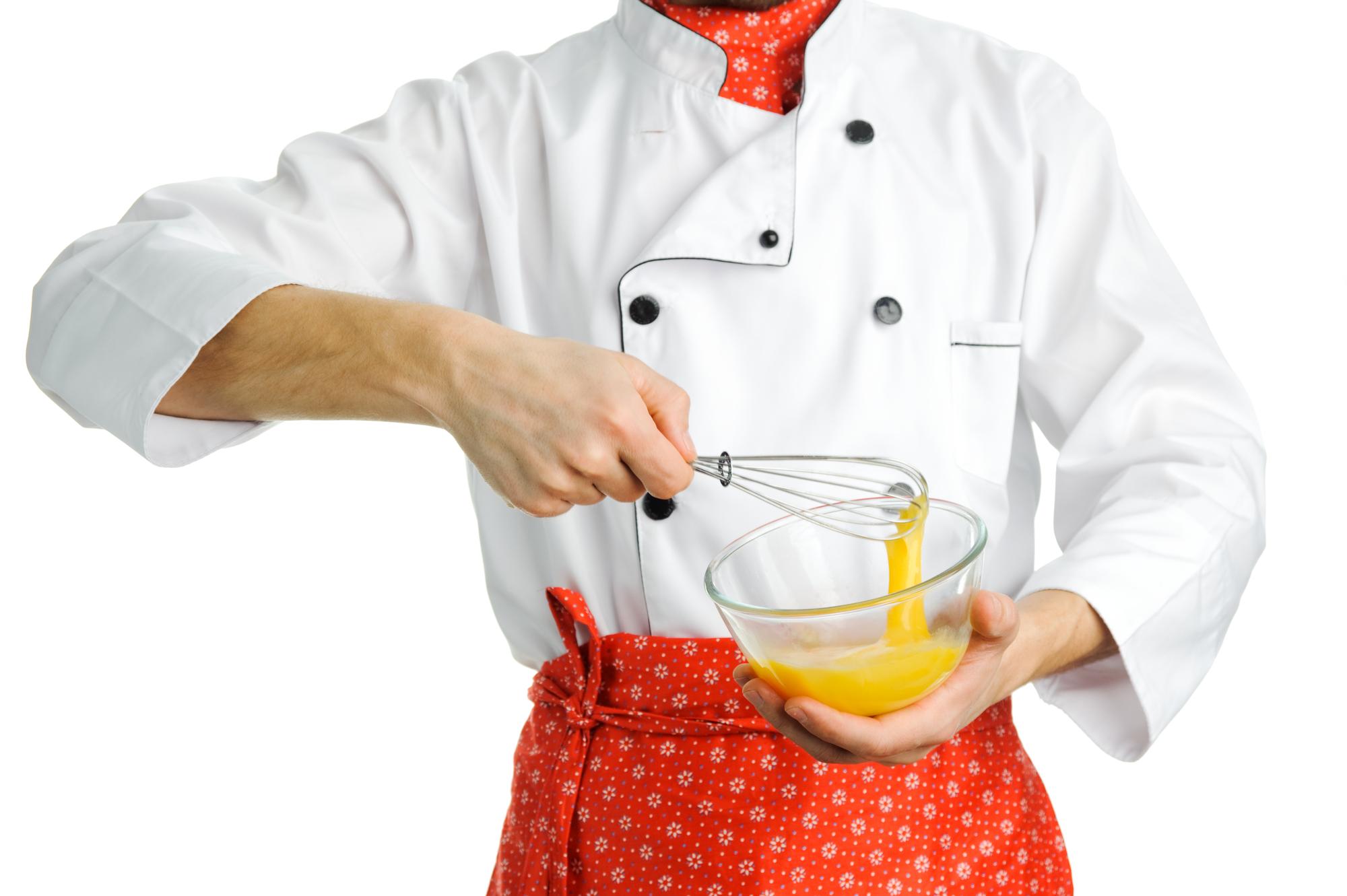 Chef demonstrating plating technique